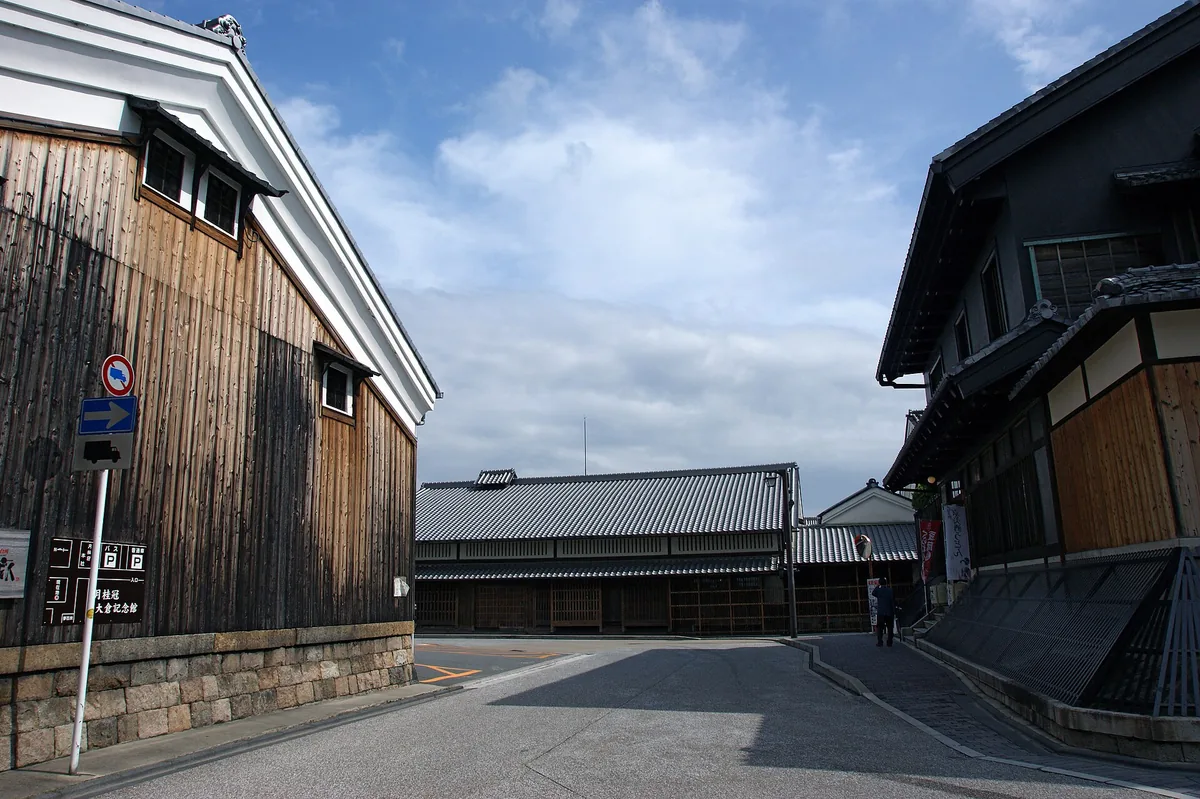 White-walled sake brewery warehouses along the Horikawa canal in Fushimi
