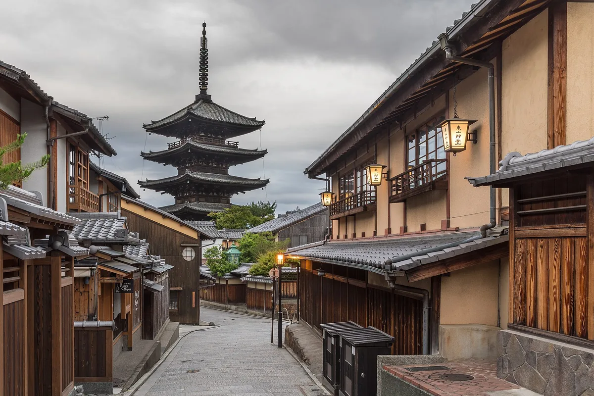 Stone-paved lanes and timber shopfronts on the Ninenzaka slope in Higashiyama, Kyoto