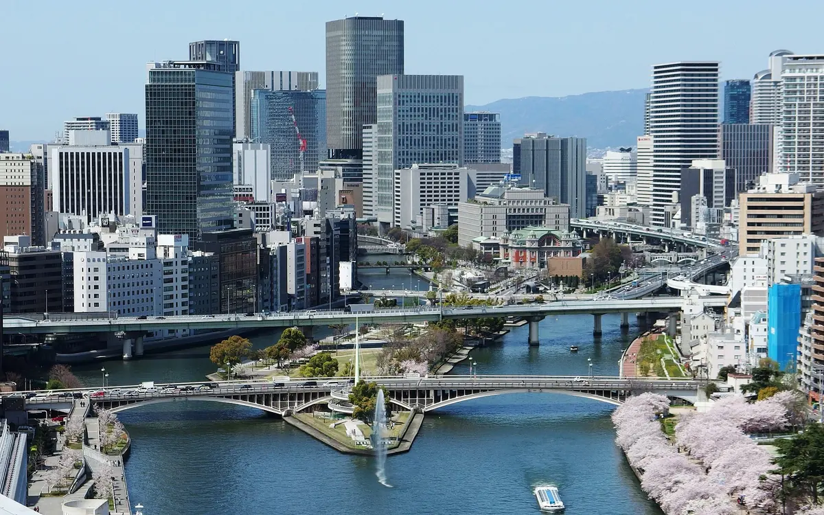The riverside path along the Okawa with Osaka Castle in the distance